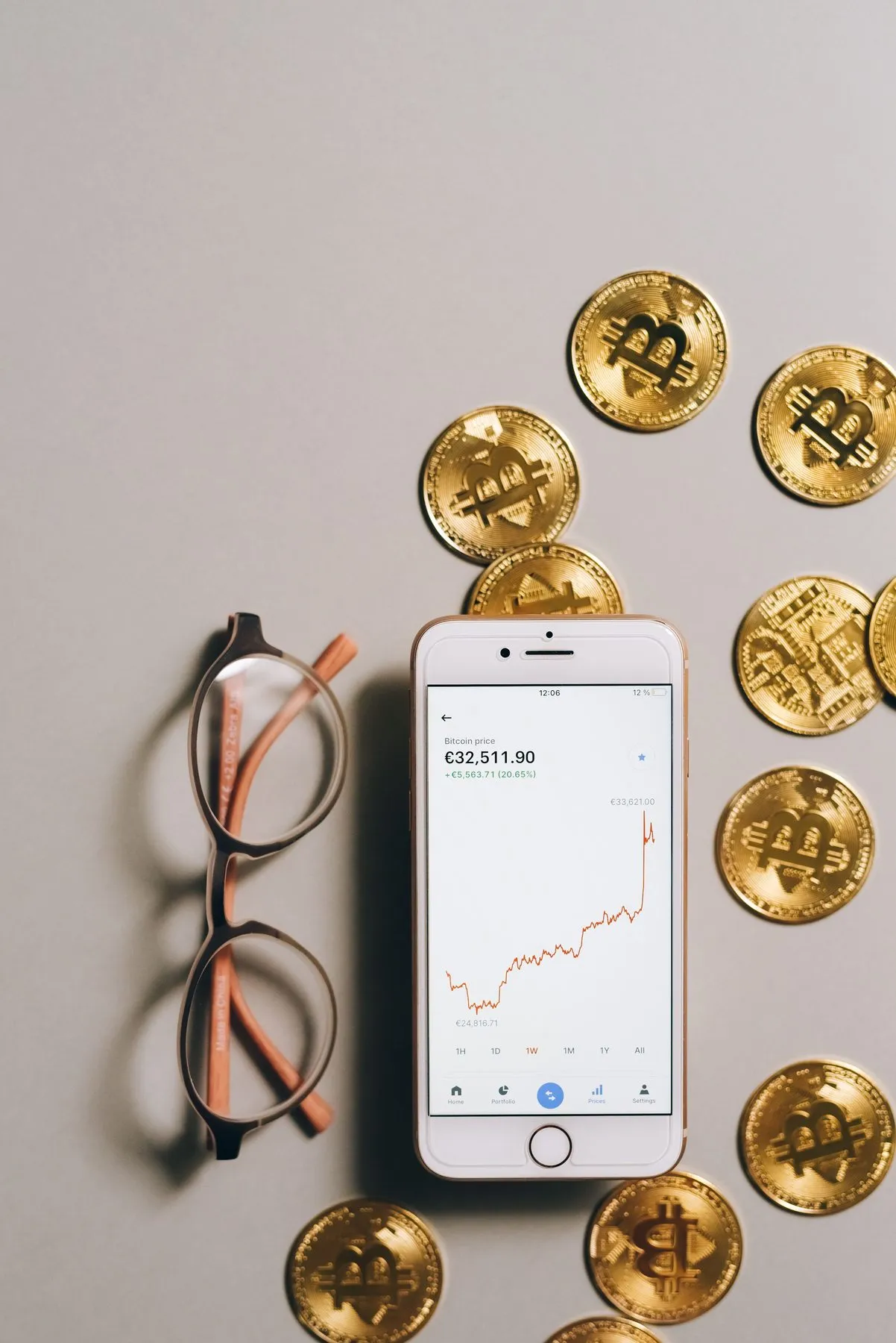 Smartphone showing a crypto price chart, used to check the Dogecoin to lari rate in Georgia