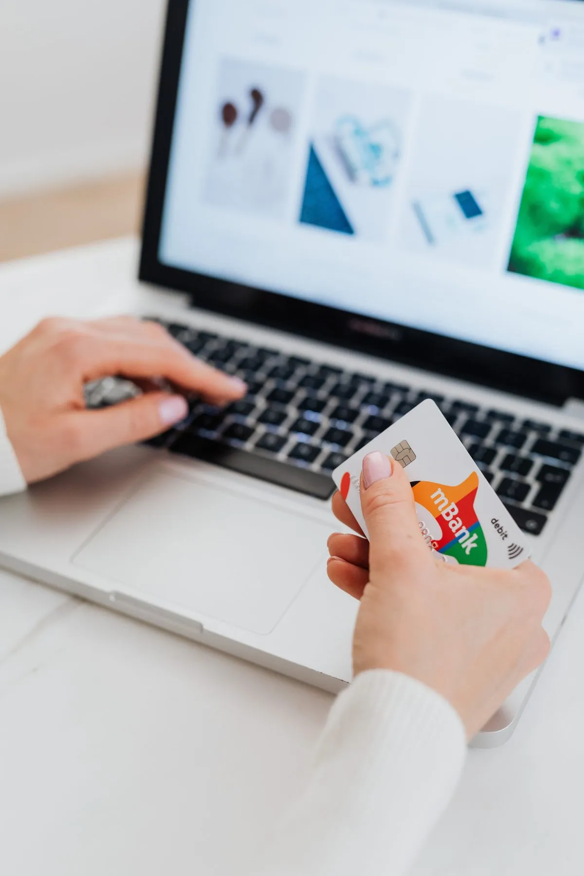 Online payment with a bank card on a laptop