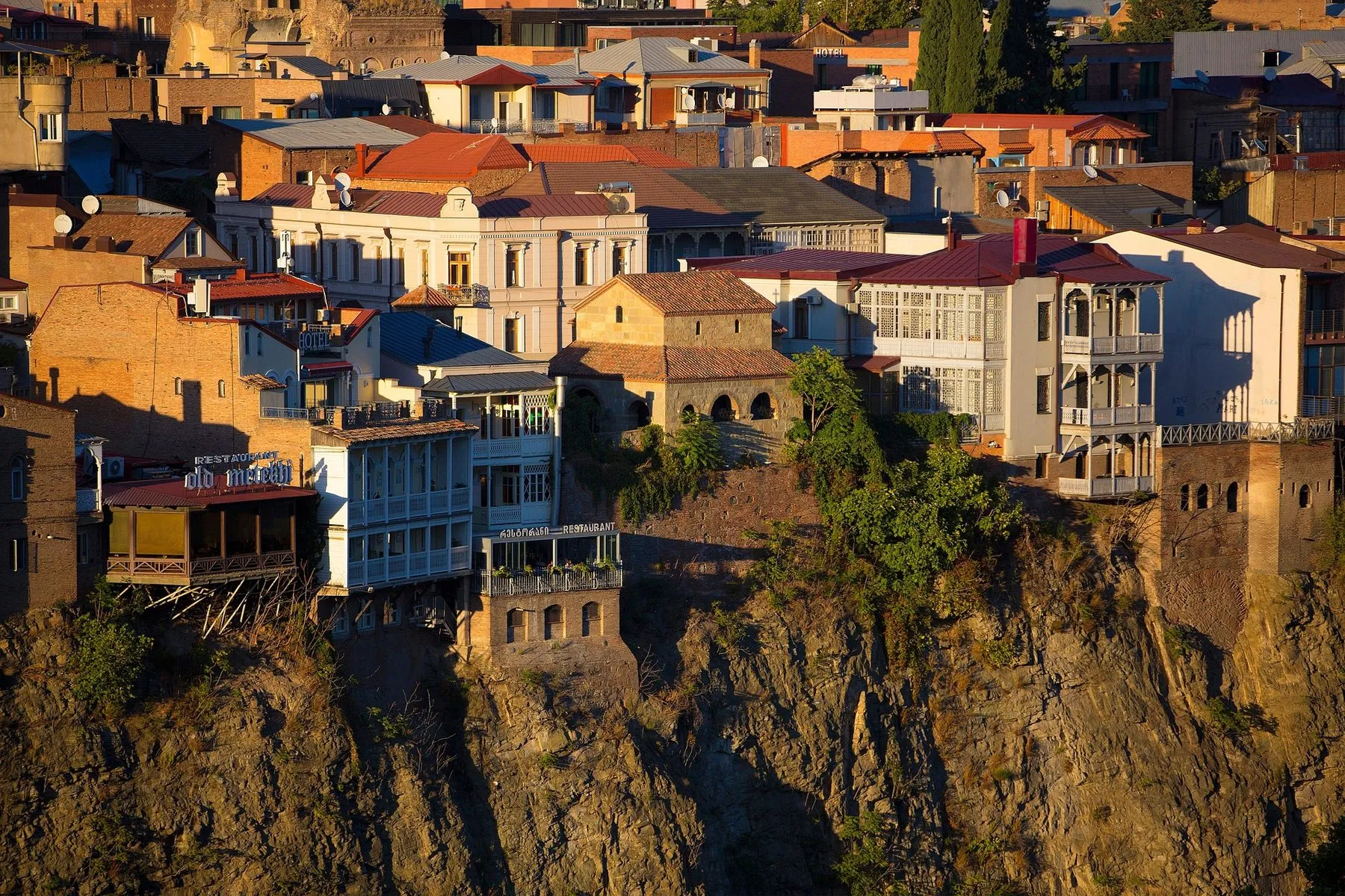 Old Tbilisi houses with wooden balconies on the cliff above the Mtkvari